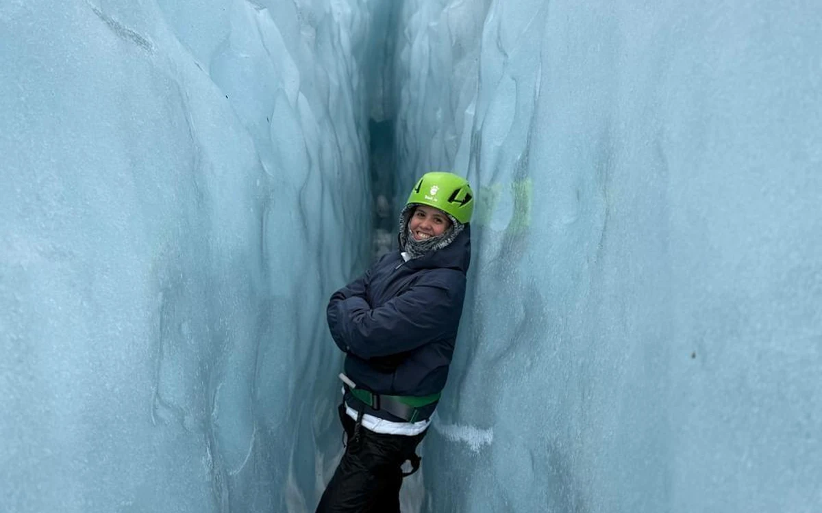 A guided group walking an easy, gently sloping section of clean glacier ice