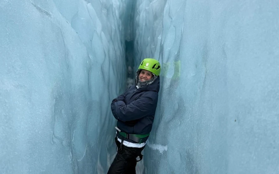 A small group walking the gentle lower ice of Falljökull glacier