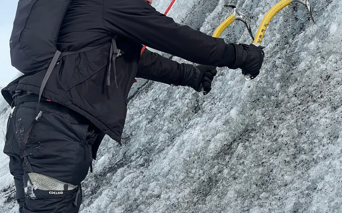 A guided group in crampons walking on Sólheimajökull glacier in Iceland